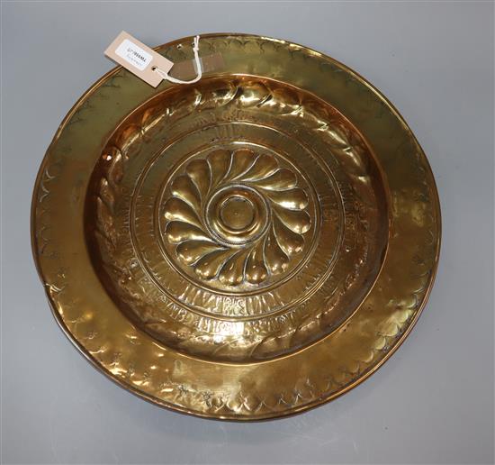 A 17th century Nuremburg embossed brass alms dish diameter 41.5cm